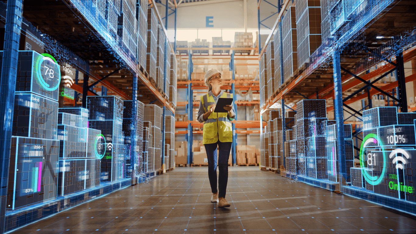 Warehouse worker using a tablet surrounded by digital data overlays showing real-time inventory and efficiency metrics.